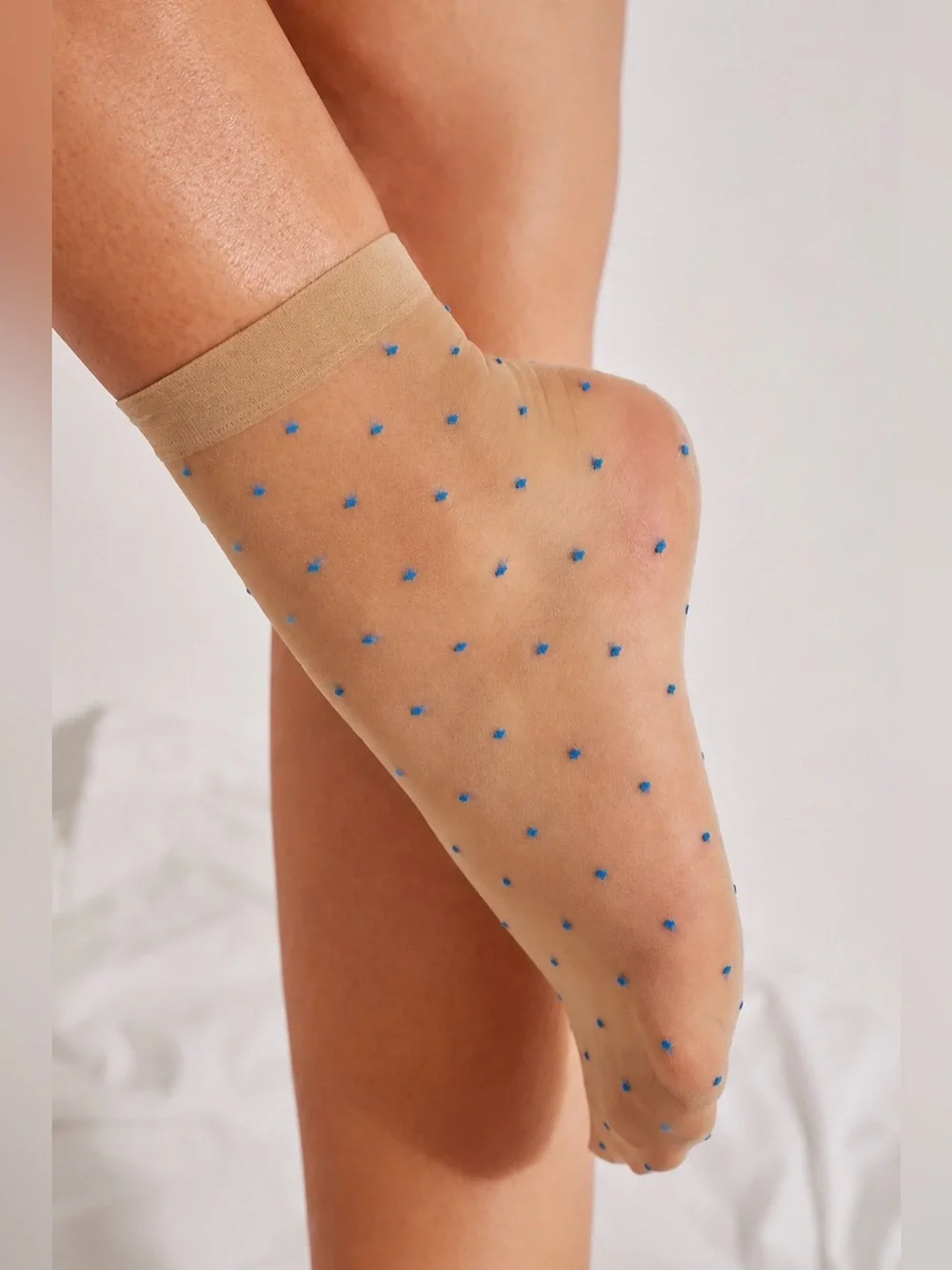Urban Outfitters .These are sheer socks from Urban Outfitters featuring a small